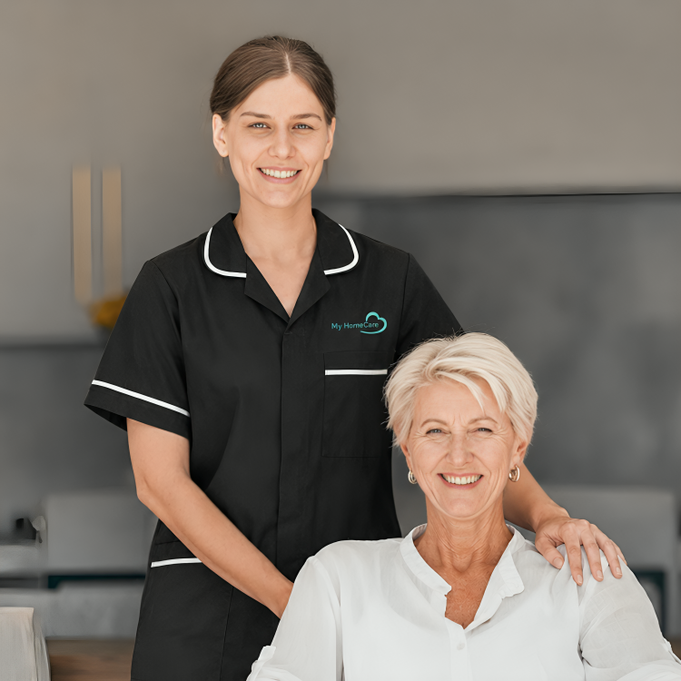 Carer and elderly woman smiling